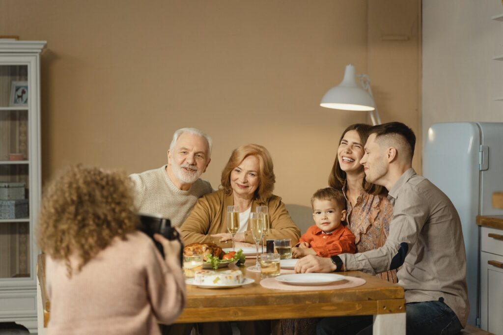 Family sitting at the dinner table eating