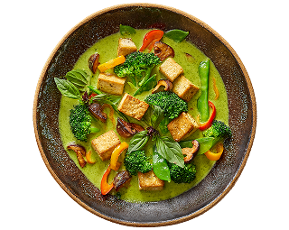A plated tofu green curry dish